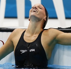 Dana Volmer reacts after winning the gold medal and setting world record at 55.98 during the women's 100m butterfly finals in the London 2012 Olympic Games at Aquatics Centre.