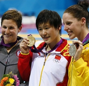 Caitlin Leverenz (USA), left, and Ye Shiwen (CHN), middle, and Alicia Coutts (AUS), right, pose with their medals after the women's 200m individual medley finals during the London 2012 Olympic Games at Aquatics Centre.