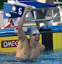 David Plummer wins the 100 backstroke at the 2010 USA Swimming nationals.