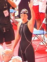 Amy Van Dyken waves.