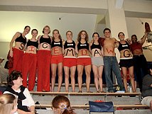 Kristy Kowal (she's the first "S") leads a group of Georgia fans in cheers at the 2003 Women's NCAA Championships.
