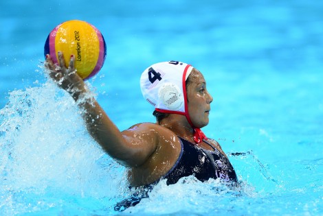 Aug 9, 2012; London, United Kingdom; USA player Brenda Villa (4) throws a pass in the third quarter against Spain in the women's gold medal match during the London 2012 Olympic Games at Water Polo Arena. Mandatory Credit: Andrew Weber-USA TODAY Sports