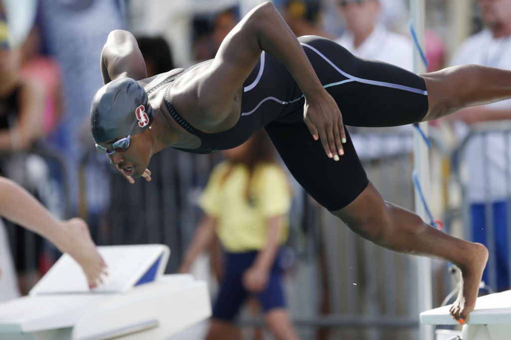 Jun 20, 2015; Santa Clara, CA, USA; Simone Manuel (USA) wins the Women's 50M Freestyle in a time of 24.75 during the Championship Finals in evening session of Day 3 at the George F. Haines International Swim Center in Santa Clara, Calif. Mandatory Credit: Bob Stanton-USA TODAY Sports