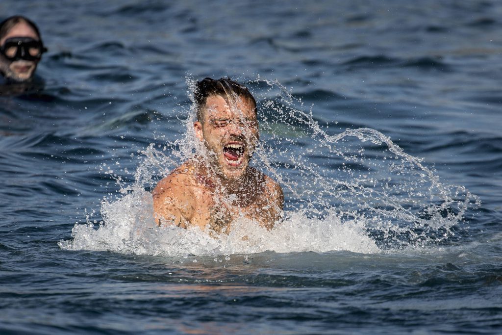 Alessandro De Rose of Italy reacts after diving from the 27 metre platform during the third stop of the Red Bull Cliff Diving World Series at Polignano a Mare, Italy on 23 July 2017. // Dean Treml/Red Bull Content Pool // P-20170723-01425 // Usage for editorial use only // Please go to www.redbullcontentpool.com for further information. //