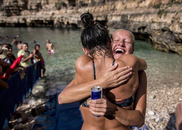 Rhiannan Iffland (R) of Australia and Jacqueline Valente of Brazil congratulate one another during the third stop of the Red Bull Cliff Diving World Series at Polignano a Mare, Italy on 23 July 2017. // Dean Treml/Red Bull Content Pool // P-20170723-01483 // Usage for editorial use only // Please go to www.redbullcontentpool.com for further information. //