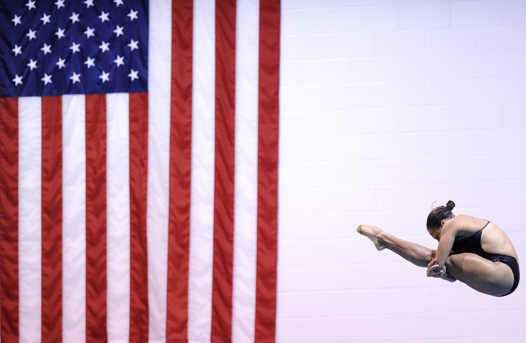 Harvard's Mikaela Thompson performs a dive during a swim meet between Columbia and Harvard Universities at Harvard College on Friday November 16, 2018. Photo by Joseph Prezioso