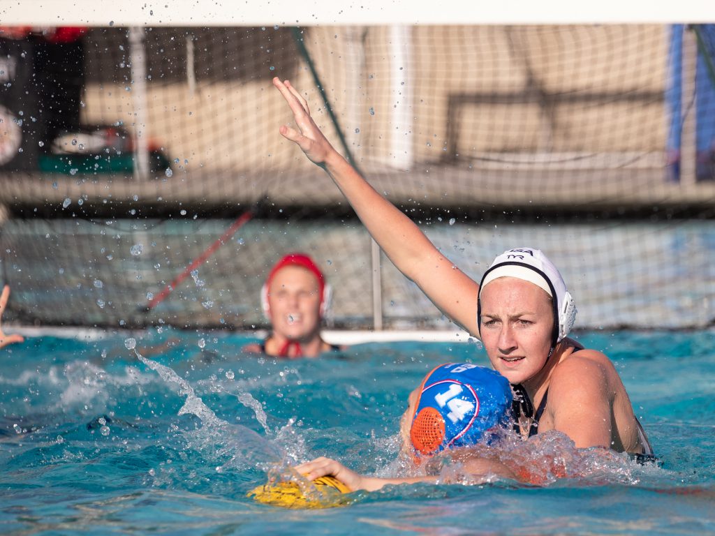 U.S. women's water polo December 22, 2018; El Torro High School, Lake Forest, CA, USA; USA Water Polo Women's Water Polo Exhibition Series: USA vs Netherlands; USA Paige Hauschild pressures Netherlands Simone van der Kraats Photo credit: Catharyn Hayne