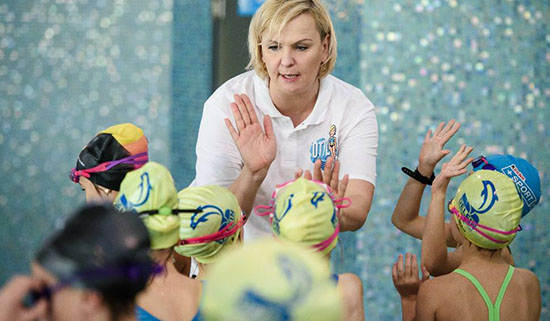 Otylia Jedrzejczak works with young swimmers