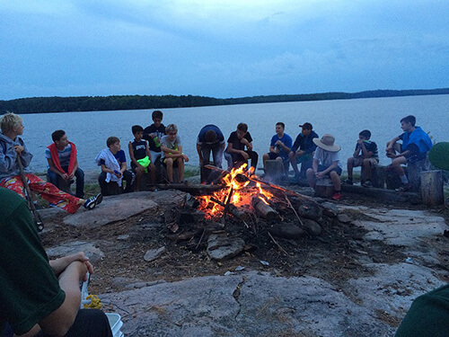 Camp Chikopi fire by lake