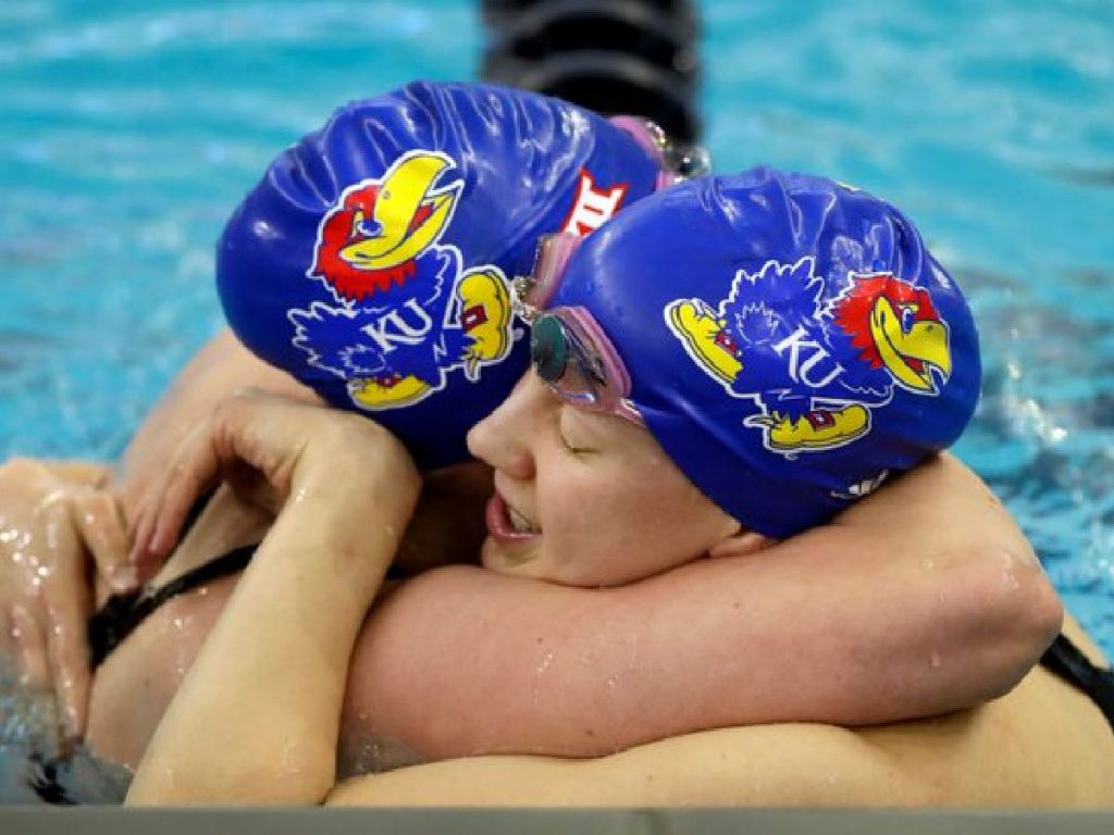 kansas hug teammate