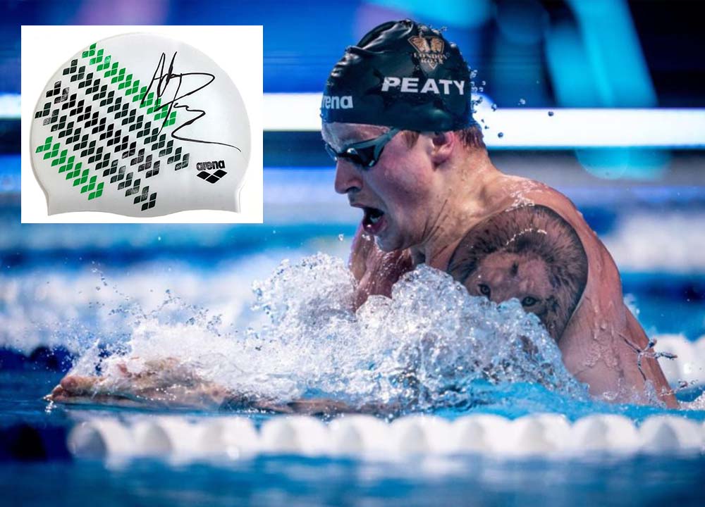 adam peaty with signed cap-ishof-silent-auction