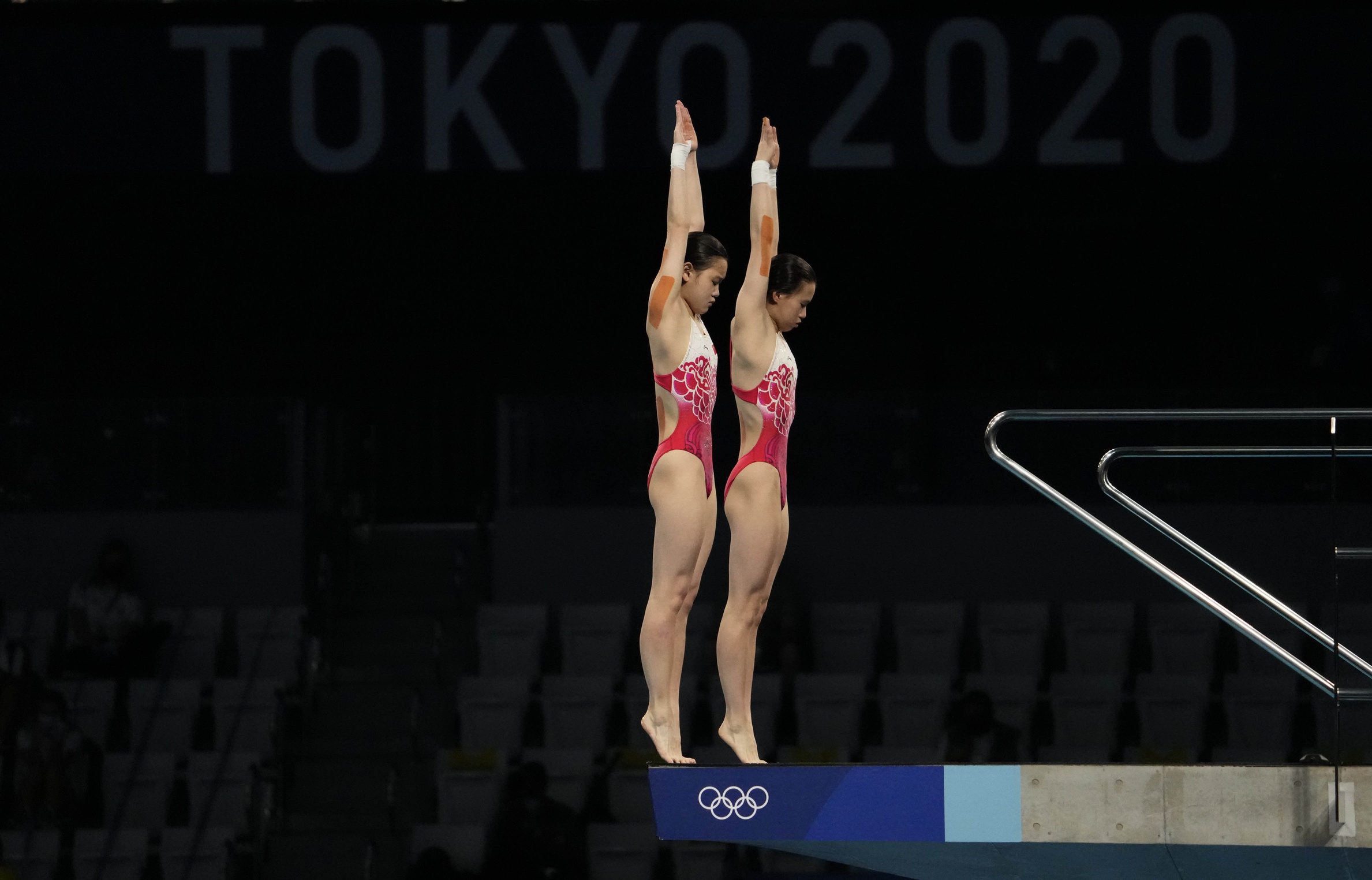 Jul 27, 2021; Tokyo, Japan; Chen Yuxi an Zhang Jiaqi (CHN) in the women's 10m platform synchronized diving competition during the Tokyo 2020 Olympic Summer Games at Tokyo Aquatics Centre. Mandatory Credit: Rob Schumacher-USA TODAY Sports