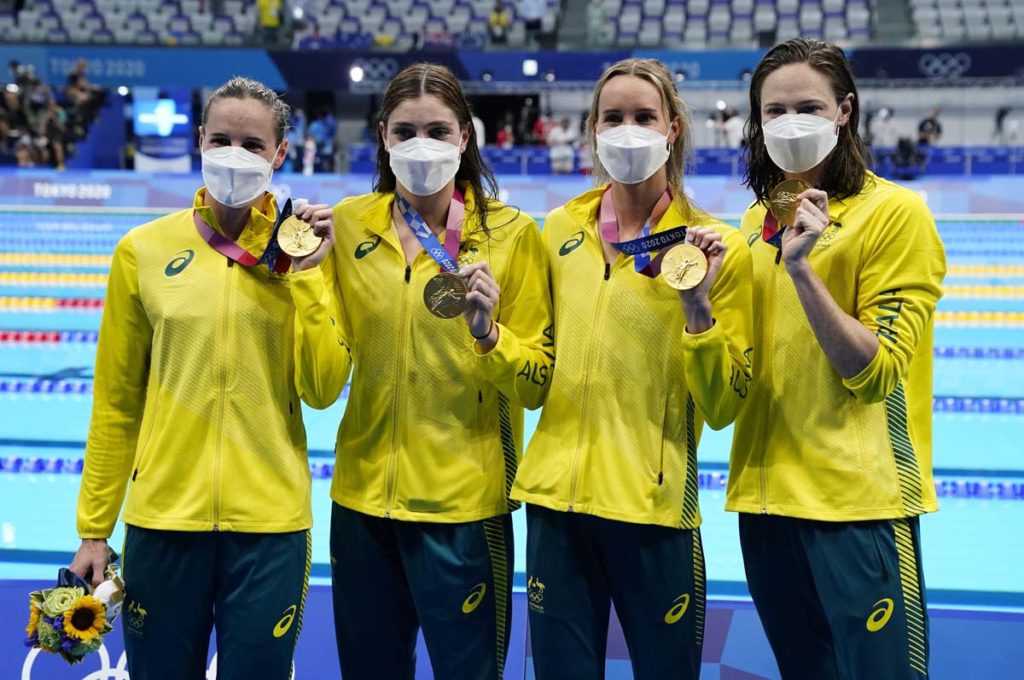 Jul 25, 2021; Tokyo, Japan; Team Australia members Bronte Campbell, Meg Harris, Emma McKeon and Cate Campbell celebrate their gold medal during the medals ceremony for the women's 4x100m freestyle relay during the Tokyo 2020 Olympic Summer Games at Tokyo Aquatics Centre. Mandatory Credit: Rob Schumacher-USA TODAY Network