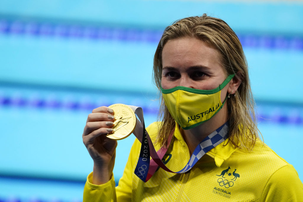 Jul 28, 2021; Tokyo, Japan; Ariarne Titmus (AUS) with her gold medal during the medals ceremony for the women's 200m freestyle during the Tokyo 2020 Olympic Summer Games at Tokyo Aquatics Centre. Mandatory Credit: Rob Schumacher-USA TODAY Sports
