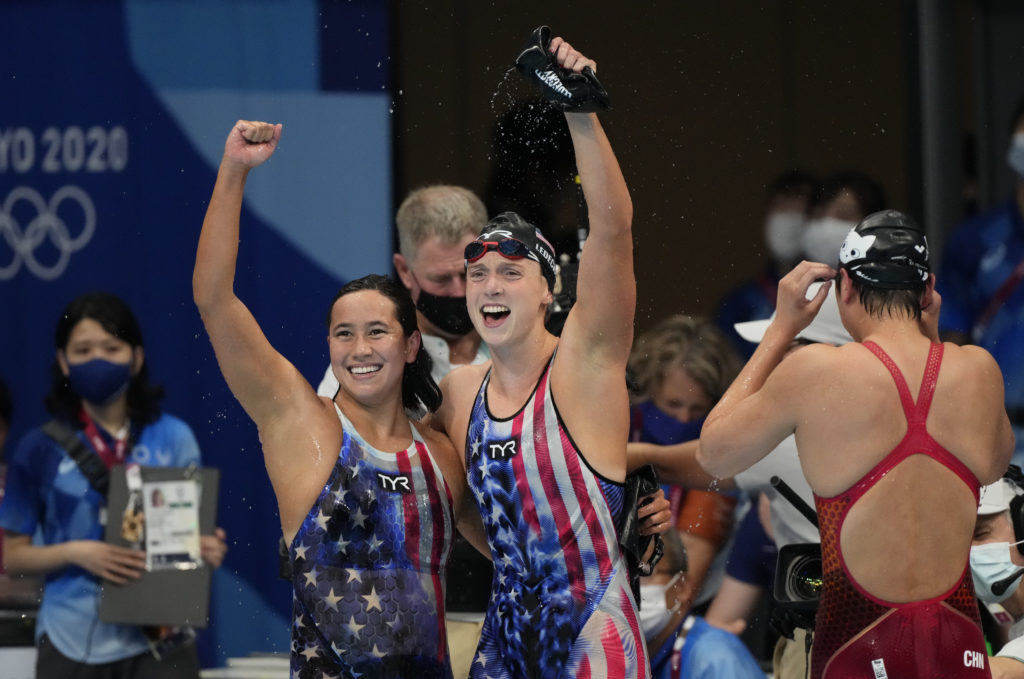 Jul 28, 2021; Tokyo, Japan; Katie Ledecky (USA) and Erica Sullivan (USA) celebrate after placing first and second in the women's 1500m freestyle final during the Tokyo 2020 Olympic Summer Games at Tokyo Aquatics Centre. Mandatory Credit: Rob Schumacher-USA TODAY Sports