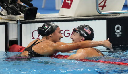 Jul 31, 2021; Tokyo, Japan; Katie Ledecky (USA) and Simona Quadarella (ITA) hug after placing first and third in the women's 800m freestyle final during the Tokyo 2020 Olympic Summer Games at Tokyo Aquatics Centre. Mandatory Credit: Rob Schumacher-USA TODAY Sports