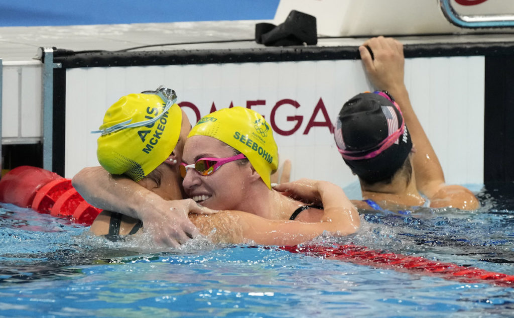 Jul 31, 2021; Tokyo, Japan; Kaylee McKeown (AUS) and Emily Seebohm (AUS) celebrate finishing first and third in the women's 200m backstroke final during the Tokyo 2020 Olympic Summer Games at Tokyo Aquatics Centre. Mandatory Credit: Rob Schumacher-USA TODAY Sports