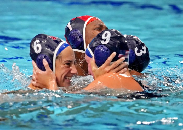 Aug 7, 2021; Tokyo, Japan; United States driver Margaret Steffens (6) and centre forward Aria Fischer (9) celebrates after beating Spain in the women's waterpolo gold medal match during the Tokyo 2020 Olympic Summer Games at Tatsumi Water Polo Centre. Mandatory Credit: Robert Deutsch-USA TODAY Sports