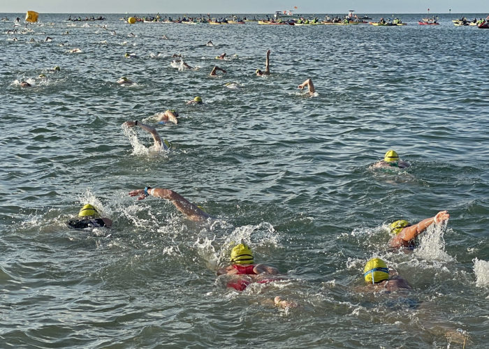 Competitors in the Swim for Alligator Lighthouse, an open-water, long-distance event, cross the start line Saturday, Sept. 11, 2021, in Islamorada, Fla., head to Alligator Reef Lighthouse, four miles off the Florida Keys. After rounding the lighthouse they swim back to shore. The event began in 2013 to help raise awareness to preserve the almost 150-year-old lighthouse as well as five other lighthouses off the Keys. This year’s contest has attracted 461 swimmers. FOR EDITORIAL USE ONLY (Andy Newman/Florida Keys News Bureau/HO)