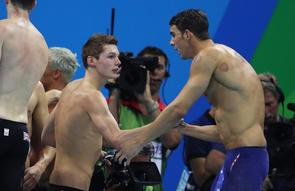 RIO DE JANEIRO, BRAZIL - AUGUST 08: Duncan Scott of Great Britain and Michael Phelps of United States are seen during the Men's 4 x 200m Freestyle Relay on Day 4 of the Rio 2016 Olympic Games at the Olympic Aquatics Stadium on August 9, 2016 in Rio de Janeiro, Brazil. (Photo by Ian MacNicol/Getty Images)